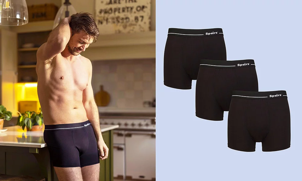 Man relaxing wearing black cotton trunks
