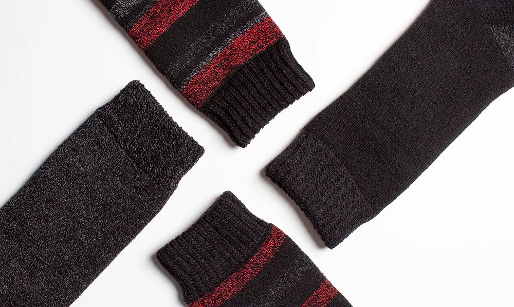 Man wearing black and grey striped bamboo blend socks