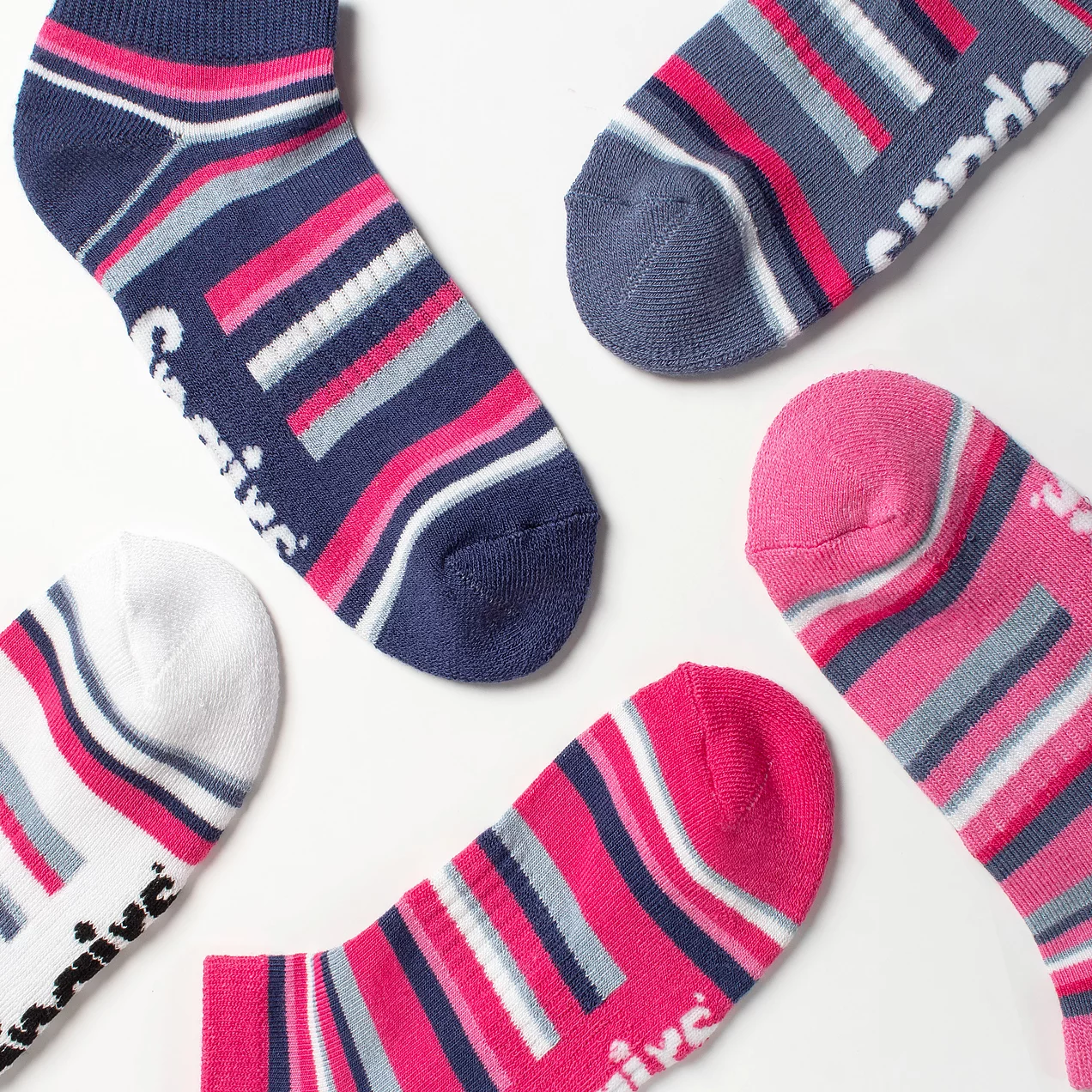 Close-up of woman wearing pink bamboo cushioned trainer socks