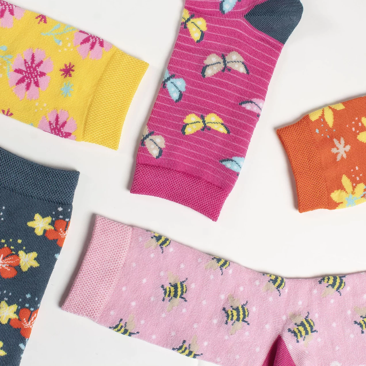 Five pair pack of women's yellow, pink & orange floral novelty socks