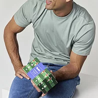 Man holding football design bamboo socks gift box